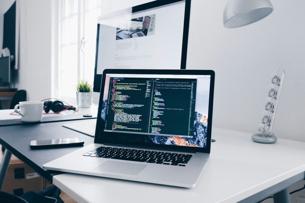 affiliate marketing for beginners - laptop with code and content