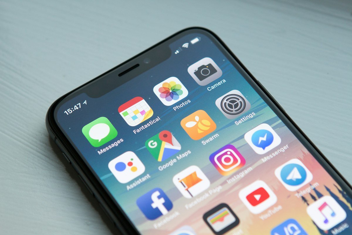 How to make money with a membership site - planning content on a phone