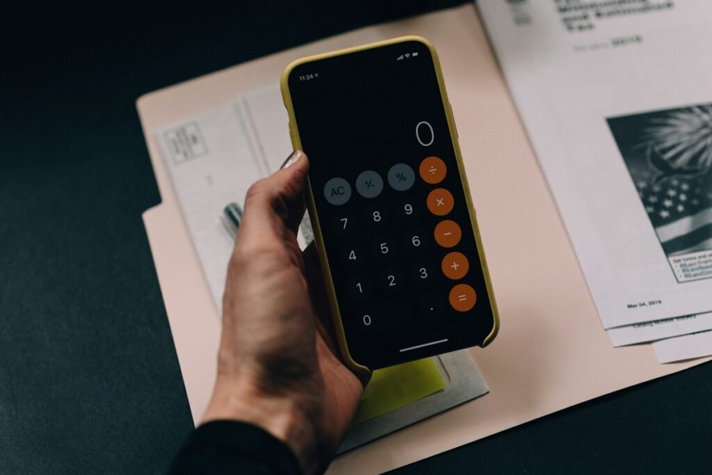 Bookkeeping jobs online - calculator and financial documents